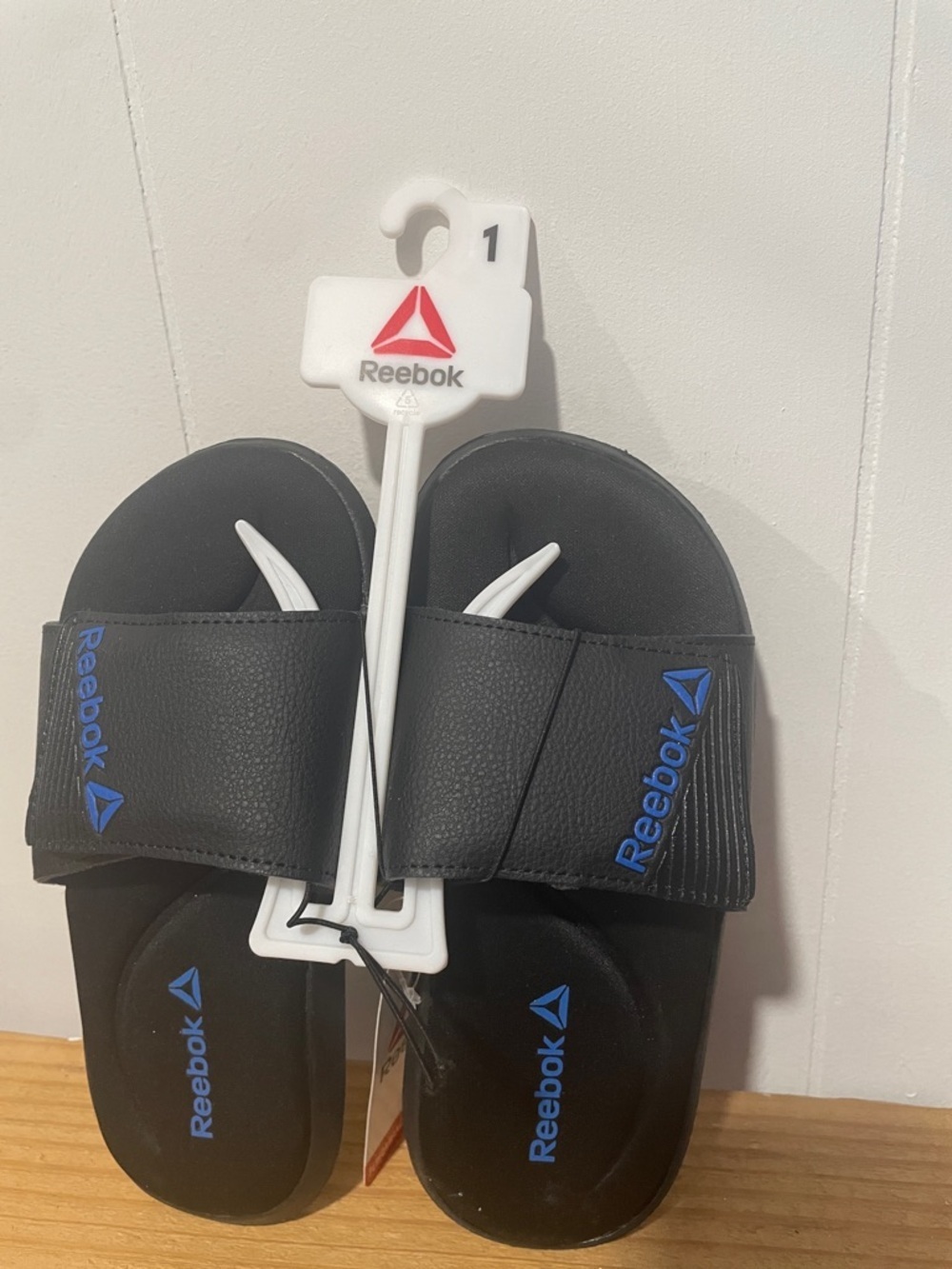 Reebok Black Slide Sandals with Blue Accents